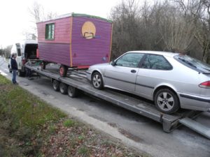 the dragonfly wagon on its trailer at its arrival