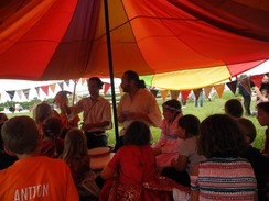 reading the dragonfly and seahorse story to a captivated audience